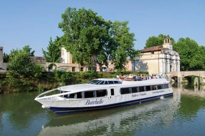 Step aboard in padua for a brenta riviera cruise, guided villa tours, and arrive right in venice. includes multilingual guide, air-conditioned boat, and restroom onboard.