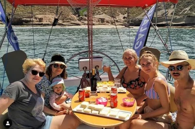 Feel the sea breeze off tenerife south as you spot whales and dolphins from a small-group sailboat. includes snacks, snorkeling gear, and a friendly local crew.