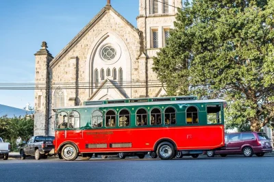 Step onto a fredericksburg trolley for a narrated historic district tour, see german landmarks, visit a painted church, and enjoy local stories with bottled water included.