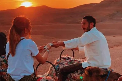 Experience a sunset camel ride, traditional dinner, and live show in agafay desert near marrakech. includes hotel transfer and local guide.