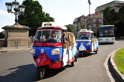 Feel budapest’s energy from a tuk tuk with a local guide, stopping at parliament, thermal baths, and the market hall. includes pickup and flexible itinerary.
