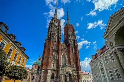 Feel the pulse of wrocław on a walking tour through market square, meet its famous dwarfs, and cross bridges to cathedral island. includes expert guide.