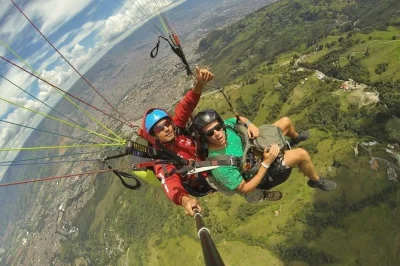 Feel the rush of paragliding above medellin and bello, capture hd gopro footage, and relax with private transport. includes gear, pilot, and pickup.