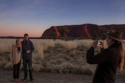 Wake early for a sunrise at uluru, hear dreamtime stories with a local guide, enjoy an outback breakfast, and explore mutitjulu waterhole. includes pickup.