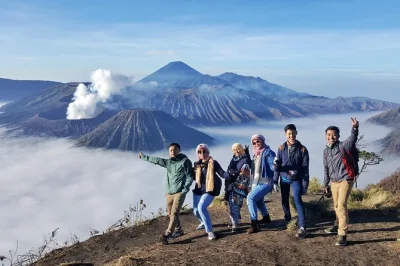Wake up before dawn for a bromo sunrise, ride a 4wd jeep across black sands, hike to the crater rim, and visit local tengger temples. pickup in malang included.