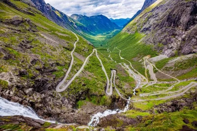 Feel the spray at gudbrandsjuvet gorge, taste valldal strawberries, and ride up trollstigen plateau on this Ålesund day trip with a local guide and easy pickup.
