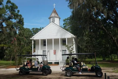 Step onto daufuskie island with a historian guide, explore gullah culture, ride golf carts to hidden landmarks, and enjoy a scenic boat trip—includes water and pickup.