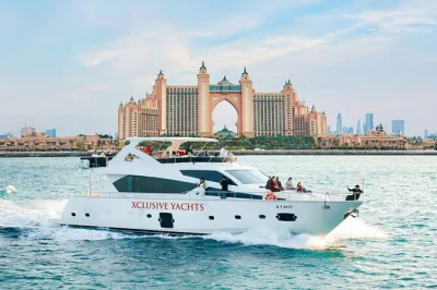 Sail dubai marina on a shared luxury yacht, pass the burj al arab, enjoy bbq or breakfast, and relax with soft drinks. includes pickup, local guide, and flexible timings.