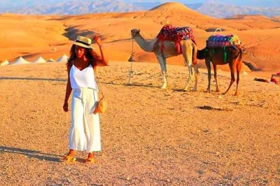Partez de marrakech pour une escapade dans l’atlas, balade à dos de chameau au coucher du soleil, partagez un thé avec des familles berbères et savourez un dîner traditionnel. transfert inclus.