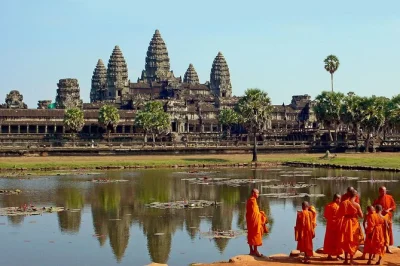 Feel the ancient energy of angkor wat, bayon’s smiling faces, and ta prohm’s jungle roots on a private day trip from siem reap with guide and hotel pickup.