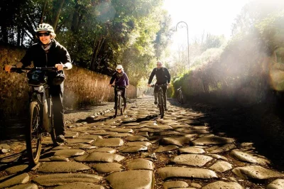 Pedal rome’s appian way by e-bike, explore ancient aqueducts, and descend into the catacombs. includes lunch or aperitif, helmet, and local guide insights.