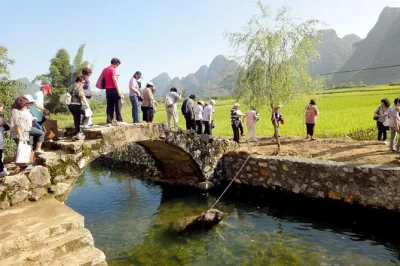 Float past guilin’s karst peaks on a li river cruise, explore yangshuo’s west street, visit a local farmer’s house, and enjoy pickup with private guide.