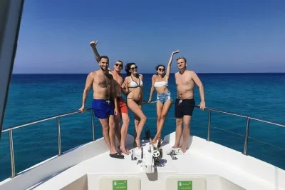 Swim in cyprus’ blue lagoon on a small boat cruise from latchi harbour, with local guides, snacks, and free wine. includes shaded deck and snorkeling gear.