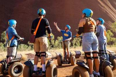 Feel the red dust, ride a segway along uluru’s base, explore ancient caves and rock art, and share stories with a local guide. includes hotel pickup.
