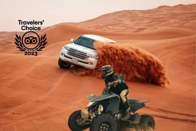 Feel the rush of dubai’s red dunes with quad biking, dune bashing, camel rides, and a bbq dinner under desert stars. includes pickup and live shows.