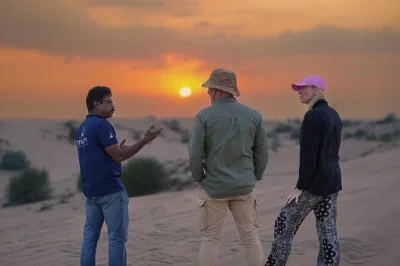 Feel the thrill of dubai’s red dunes on a sunset safari with sandboarding, camel ride, and hotel pickup. includes 4x4 dune bashing and local guide.