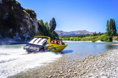Feel the rush in queenstown with a jet boat ride on kawarau & shotover rivers, starting from main town pier. includes guide, life vest, and hassle-free departures.
