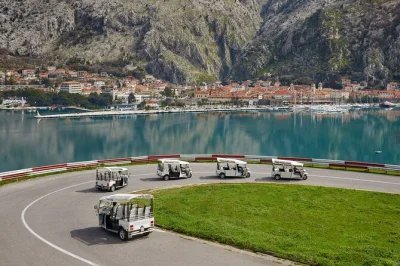Feel the breeze on a silent tuk tuk ride along montenegro’s boka bay, explore kotor old town, visit our lady’s temple, and pause for coffee in porto montenegro—includes private transportation.