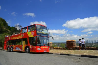 Step onto a johannesburg hop-on hop-off city tour with stops at constitution hill, apartheid museum, and more. includes hotel shuttle and optional soweto extension.