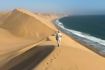 Feel the rush of dune bashing and quad biking near doha, sip tea with locals, ride camels at sealine, and relax by the inland sea. includes hotel pickup.