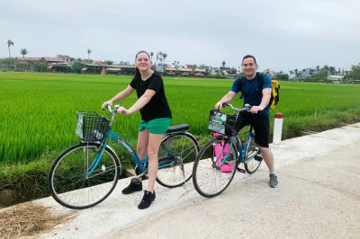 Pedal quiet roads from hoi an to tra que vegetable village, see local crafts, sip vietnamese coffee, and visit a peaceful pagoda. includes hotel pickup.