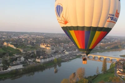 Float above the loire valley at sunrise or sunset, see châteaux from the sky, and toast with champagne after landing. includes hotel pickup near amboise.