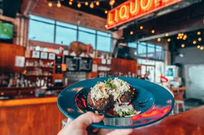 Sample louisville’s biscuits, fried chicken, bourbon balls & craft beer on a walking food tour of nulu & butchertown—includes lunch and local guide.