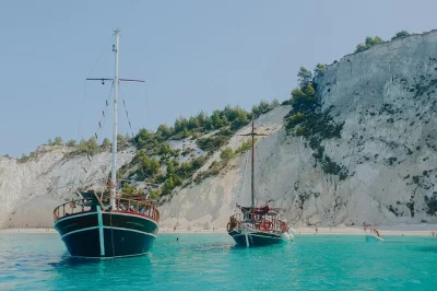 Swim at white rocks, explore vardiani islands, and relax on xi beach during this full-day ionian sea boat trip from kefalonia. includes homemade lunch and drinks.