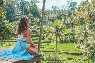 Feel the spray at tegenungan waterfall, explore goa gajah temple, and gaze over tegalalang rice terrace on a half day trip from ubud with hotel pickup included.