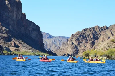 Feel the cool colorado river air as you paddle to emerald cave from willow beach, with a small group, snacks, and a local guide—hotel pickup available.