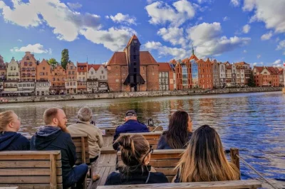 See gdansk’s shipyard, old town, and riverside monuments on a small-group wooden boat cruise with guide. includes blanket, up-close views, and relaxed pace.