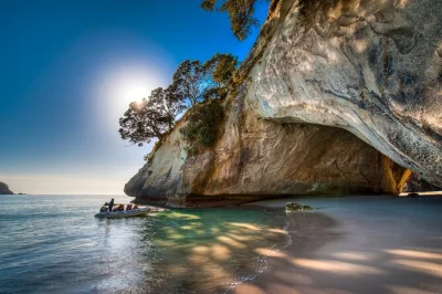 Feel the salt air on a small-group cathedral cove boat tour from hahei beach. explore sea caves, spot marine life, and enjoy relaxed local stories. includes lifejacket.