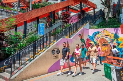 Walk medellín’s comuna 13, hear local stories, try empanadas & mango ice cream, see street art & galleries. includes snacks and guide. book your spot.