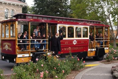 Ride a vintage-style trolley through napa valley, sample wines at 3-4 wineries, enjoy a local lunch, and hear stories from your guide. includes pickup at oxbow market.