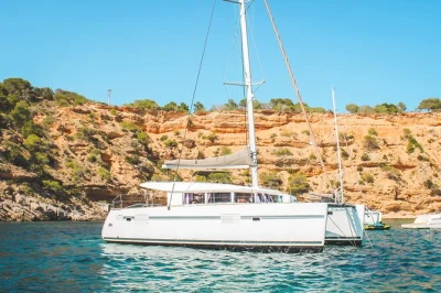 Sail ibiza’s coast on a private catamaran, swim by es vedrà, snorkel secret coves, enjoy lunch options and music—includes fuel, sup, and wifi onboard.