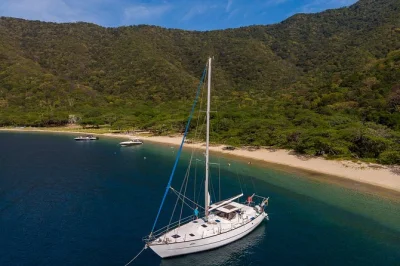 Feel the breeze on a tayrona sailing trip from santa marta, swim in bahía concha, share stories with locals, and enjoy fresh fish grilled right on the boat. includes gear & snacks.