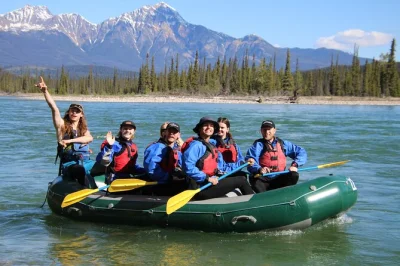 Feel the splash of athabasca river rapids near jasper, float through wild scenery, and share laughs with your guide. includes pickup and all fees.