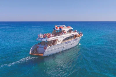Feel the cyprus breeze on a 4-hour protaras cruise past sea caves, fig tree bay, and turtle bay. includes swim stops, lunch option, and local crew for a laid-back day.