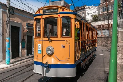 Step onto rio’s historic tram, wander santa teresa’s cobbled lanes, descend the selarón steps, and taste café culture at confeitaria colombo. includes pickup.