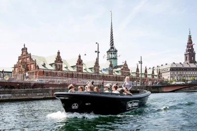 Share laughs with locals on a copenhagen canal tour, explore trekroner fortress, sail past nyhavn & the opera house. small group boat trip with english guide.