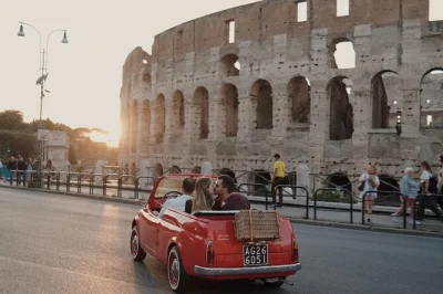 Glide through rome in a classic fiat 500 cabriolet, sipping prosecco at janiculum hill and seeing the colosseum, trastevere, and more. includes private driver.