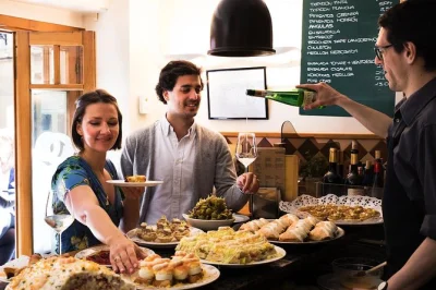 Follow a local guide through san sebastian’s buzzing old town, tasting pintxos and basque wines at lively bars. small group, all food and drinks included.
