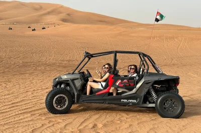 Viva a emoção do deserto de dubai com quadriciclo, dune bashing, passeio de camelo e jantar com show árabe. inclui transporte e serviço à mesa.