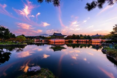 Step into silla history on a gyeongju day trip from busan with pickup, unesco bulguksa temple, royal tombs, hanok village strolls & magical palace night views.