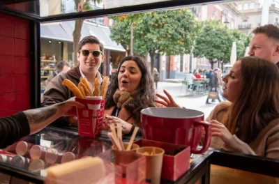Wander seville’s old town on a guided tapas tour, tasting jamon iberico, local wines, and churros. includes multiple food stops and drinks with a friendly guide.