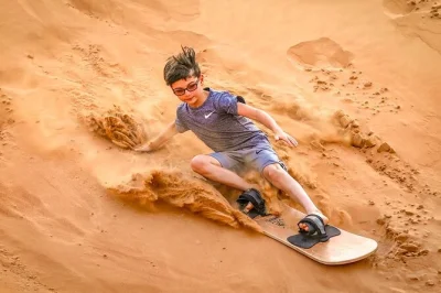 Feel the thrill of dubai’s desert with dune bashing, sandboarding, camel rides, live shows, and a bbq dinner. includes hotel pickup and local guide.
