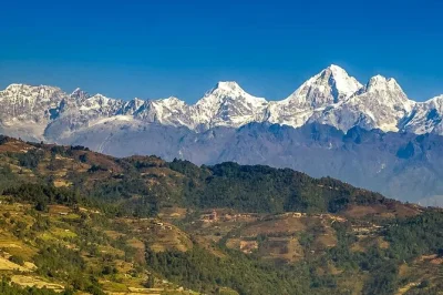 Wake up early for a sunrise at nagarkot, hike scenic trails to changu narayan temple, and enjoy breakfast with a local guide. includes hotel pickup.