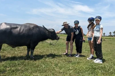 Glide through hoi an’s quiet villages by bike, row a basket boat, try fishing with locals, and join a hands-on cooking class. includes pickup and lunch.