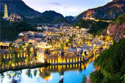 Private overnight tour from beijing to gubei water town & simatai great wall. includes hot spring hotel, cable car, meals, and airport pickup. book now.