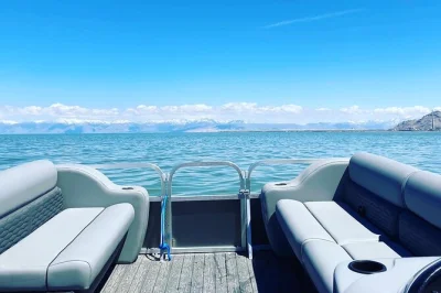 Feel the salt air on a 45-minute great salt lake boat tour with local stories, slow cruising, and mountain views. includes bottled water, commentary, and bug nets.